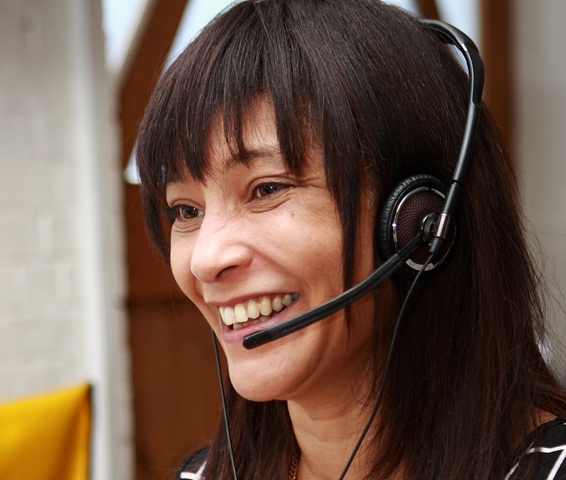 Katherine Beavis wearing a headset