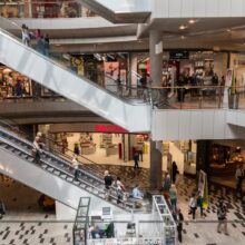 Stairs and shoppers in a mall